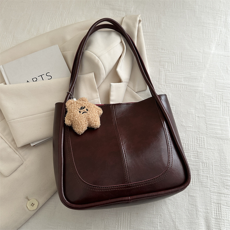 Bolsos populares para mujer 2024 otoño e invierno nuevo estilo coreano retro de gran capacidad para viajar en clase bolso de hombro bolso de moda