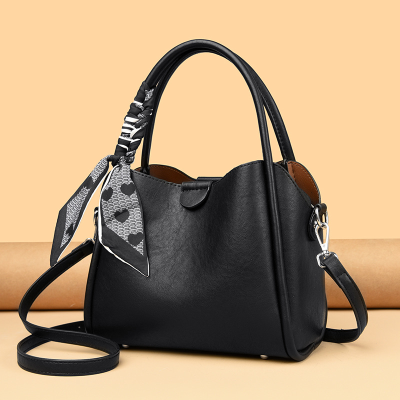 Elegante borsa a secchiello da donna con tracolla e manico_voghion.com