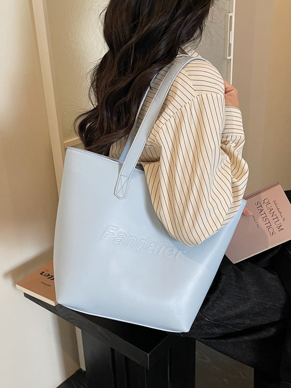 Casual gran capacidad bolso tote para mujeres 2026 venta caliente nueva ciudad simple moda versátil bolso de hombro axilar