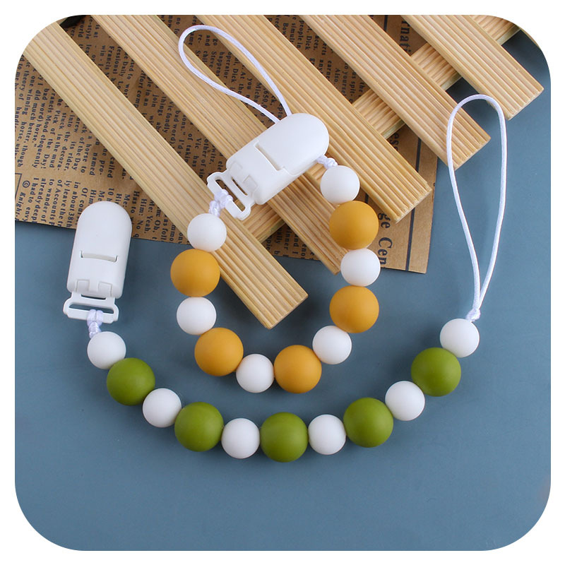 Nuevo bebé suministros plástico pico clip de silicona perlas mordedor bebé molar juguetes chupete cadena anti-perdida cadena