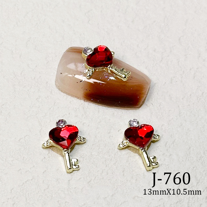 2023 Nueva joyería de uñas Año nuevo rojo aleación conejo rojo mariposa de cristal pintura en aerosol arco accesorios de diamantes de uñas