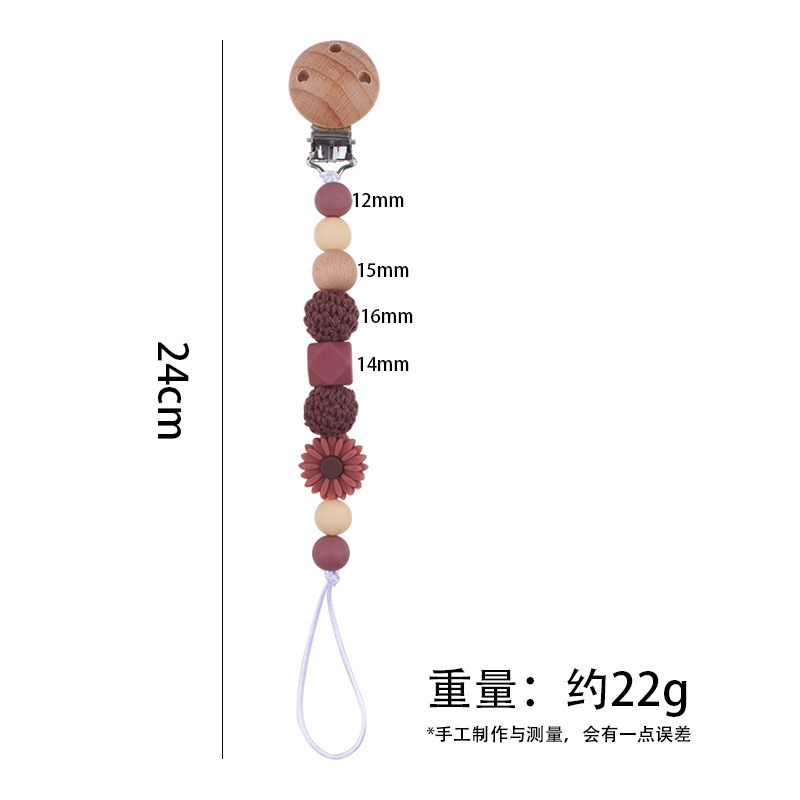 Productos para bebés Clip de chupete de haya Dibujos animados de bebé creativo pequeña margarita pequeña mordedor molar cadena de chupete anti-caída