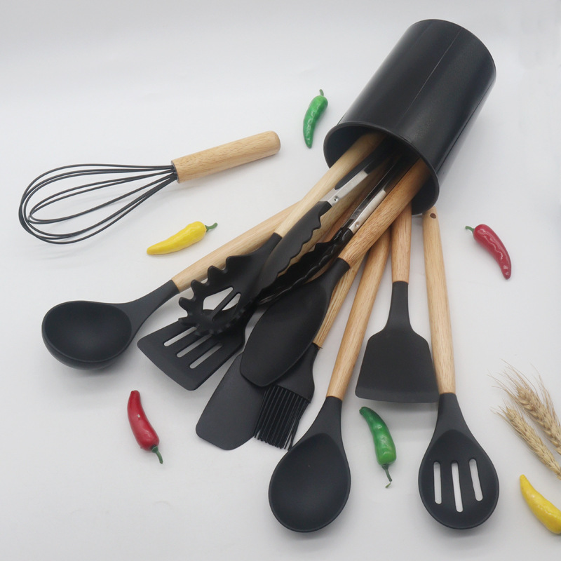 En stock silicona mango de madera utensilios de cocina 12 piezas anti-escaldadura herramientas de cocina wok pala de silicona utensilios de cocina transfronteriza