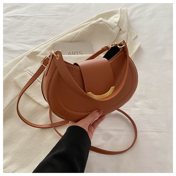 Estilo occidental de moda todo fósforo fresco redondo alta textura este año popular bolsa de color sólido diseño de nicho bolso bandolera