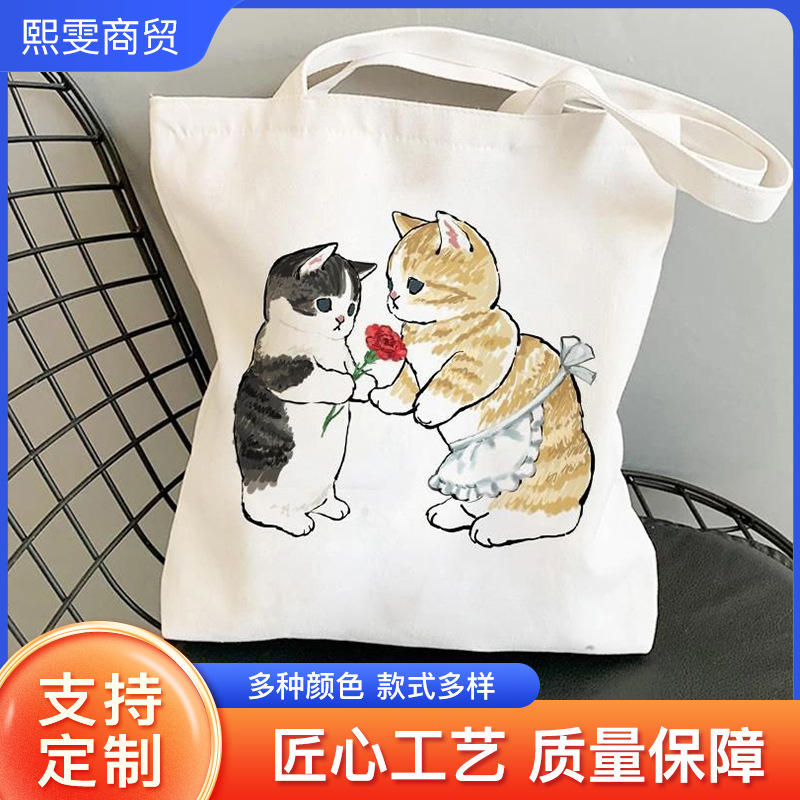 批发可爱猫咪印花手提包卡大容量通勤帆布包印logo学生单肩布包