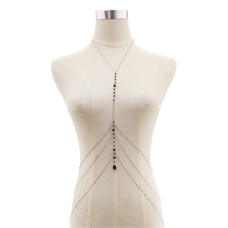 Personalidad europea y americana Cadena de pecho de cristal negro Cadena de cuerpo de borla simple mujer sexy multi-capa cristal un collar Accesorios
