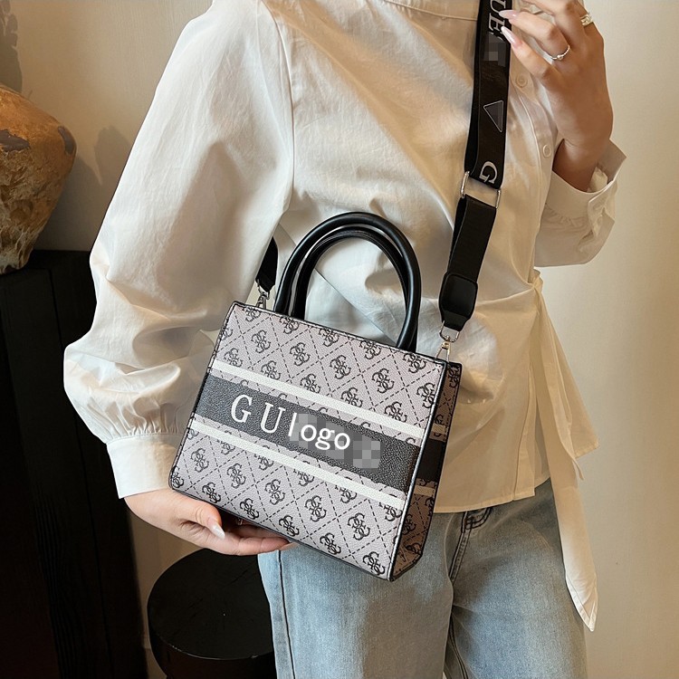 Bolso Tote impreso de comercio exterior transfronterizo Bolso bandolera de viajero de gran capacidad para mujer Bolso de letras clásicas de tendencia europea y americana