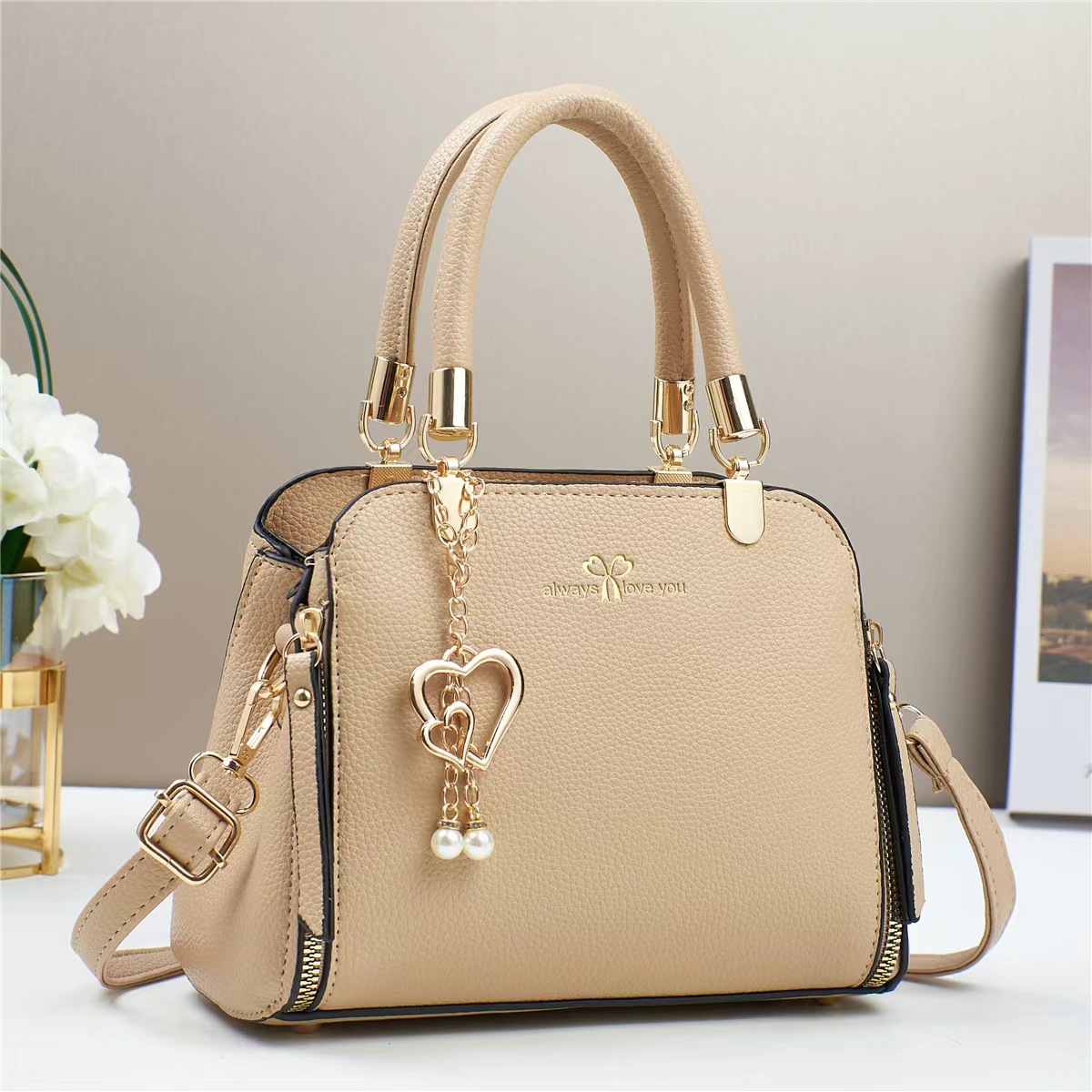 Bolso de mano de explosión bolso de mujer 2025 fabricante de comercio exterior nuevo bolso de hombro de verano atmósfera de moda universal