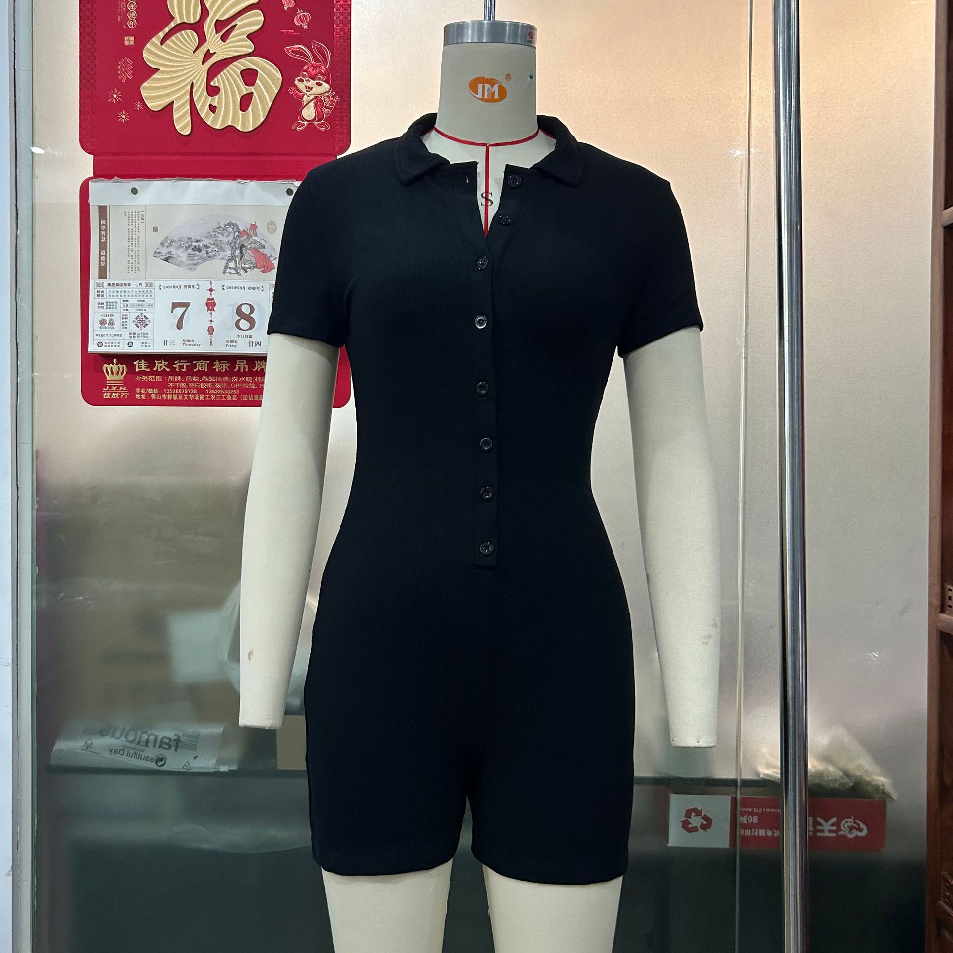 Mono de las mujeres europeas y americanas deportes casual Polo cuello solapa cardigan sexy de un solo pecho shorts mono 3135