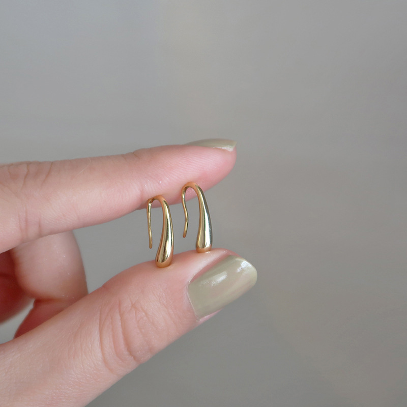 Europa y los Estados Unidos explotaron gota de agua simple pendientes compactos femeninos estilo de moda retro personalidad gancho de orejas agujeros de orejas de orejas