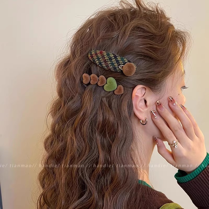 Clip de cabello de flor de leopardo para mujeres clip de cabello de alto nivel frente clip de frangeo 2025 nuevo clip lateral clip de cabello toque