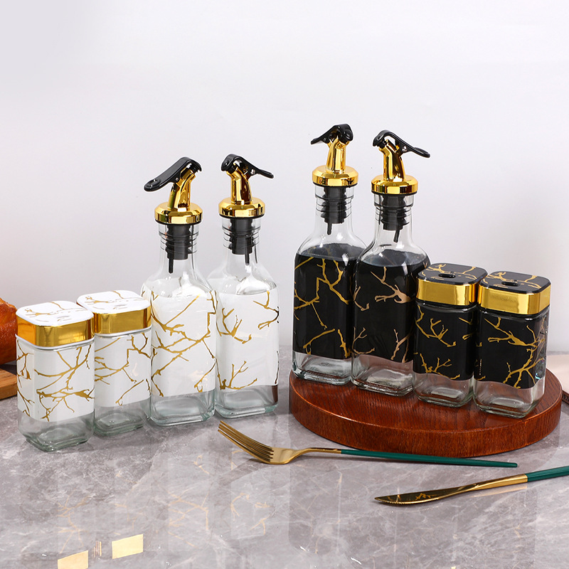 Juego de cuatro piezas de olla de aceite, botella de condimento negro, juego de caja de condimento de cocina de vidrio, pimienta doméstica, botella de sal, olla de aceite sellada