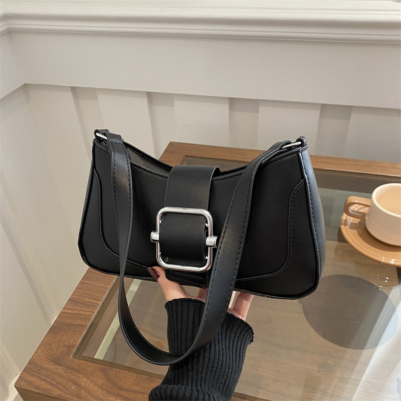 Temperamento simple y elegante bolso de hombro coreano para mujeres 2025, primavera nuevo bolso de brazo universal bolso de mujer coreano