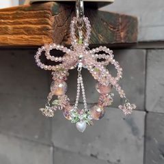 新商品の甘美な蝶結びの数珠の携帯チェーンの掛け物の小衆の軽豪華な掛け縄のファッションの清新な百合の掛け物