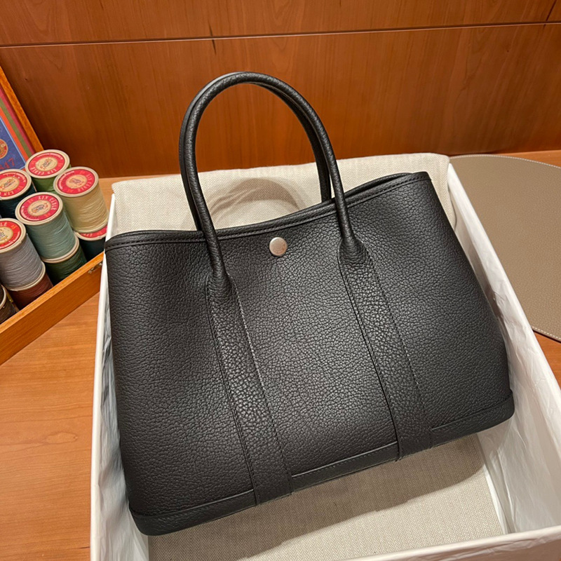 2023 Nueva bolsa de mensajero de hombro de las mujeres de cuero genuino bolso de mano bolsa de jardín portátil bolsa grande bolsa de compras bolsa de cubo