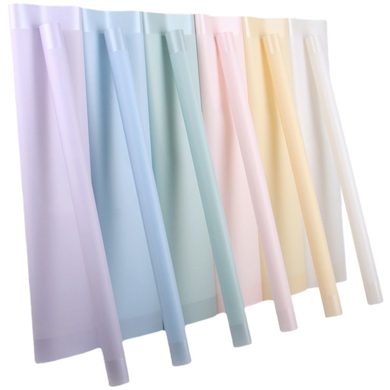 Lizhi Ran falda tutú película de gelatina borde capa papel de embalaje de flores ramo papel de embalaje al por mayor