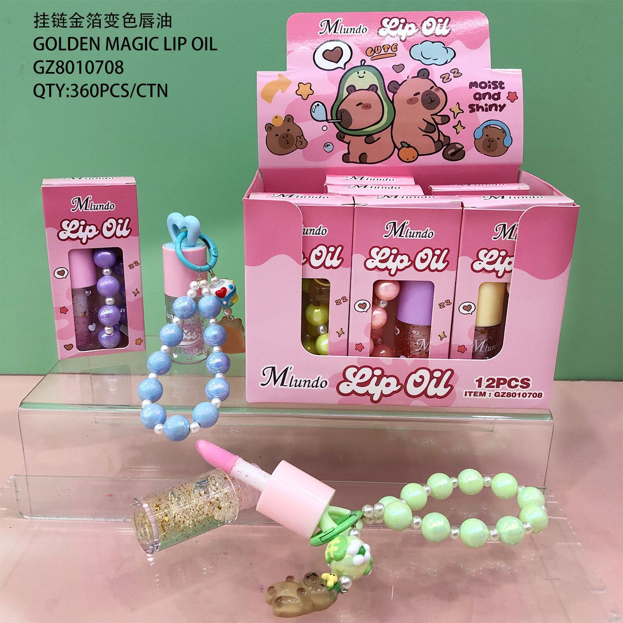 Nuevo producto Mlundo, set de aceite labial con cadena colgante y lámina dorada que cambia de color, hidratante, maquillaje hermoso y moderno, venta al por mayor del fabricante.