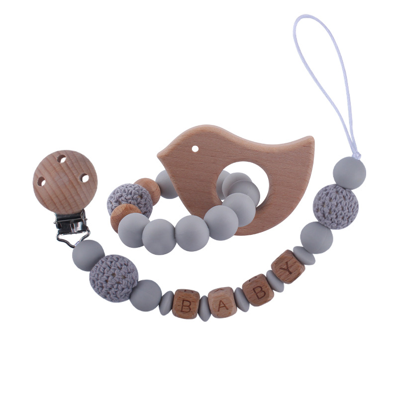 Bebé suministros de dibujos animados de haya animal pulsera de silicona DIY nombre calmante bebé molar juguete anti-caída de la cadena