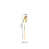 Golden tea spoon