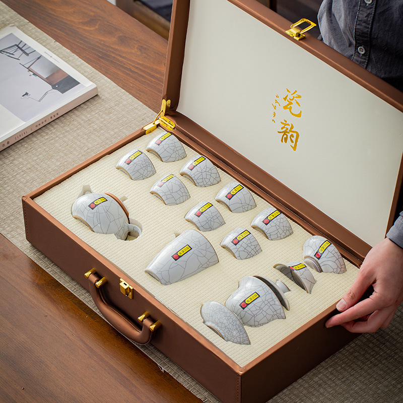 A set of inheritable Ru porcelain gongfu tea set gift for business, high-end ceramic tea set with 13 pieces, home use, in a leather box.
