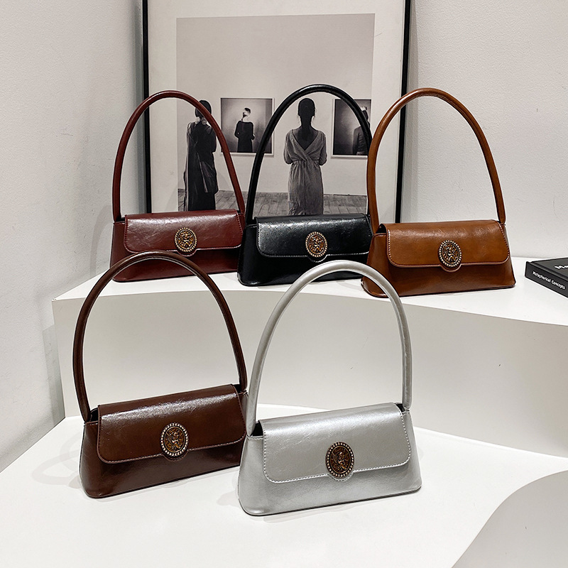Bolsos retro de estilo extranjero para mujeres otoño y invierno 2024 nuevo estilo de moda bolsas de brazo de diseño de nicho bolsas de hombro