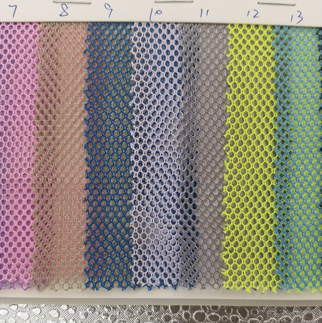 厂家现货直供批发100克全涤K080网眼布面料箱包手袋家纺布料