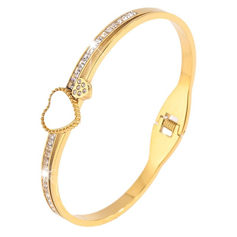 Europa y América de moda amor conchas de perforación elástica abertura pulsera de acero de titanio versión femenina temperamento pulsera de diseño simple