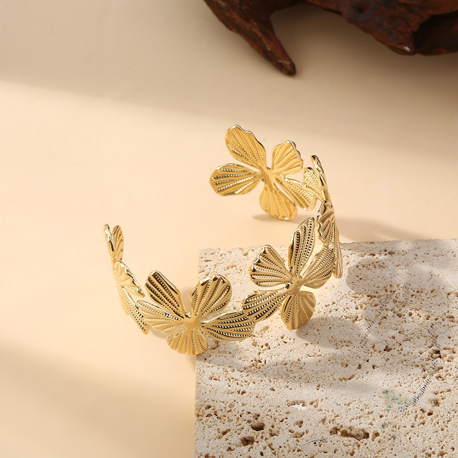 Europa y los Estados Unidos explotaron pulseras de flores de moda personalidad femenina de apertura retro empalme diseño ancho nicho de diseño de joyas