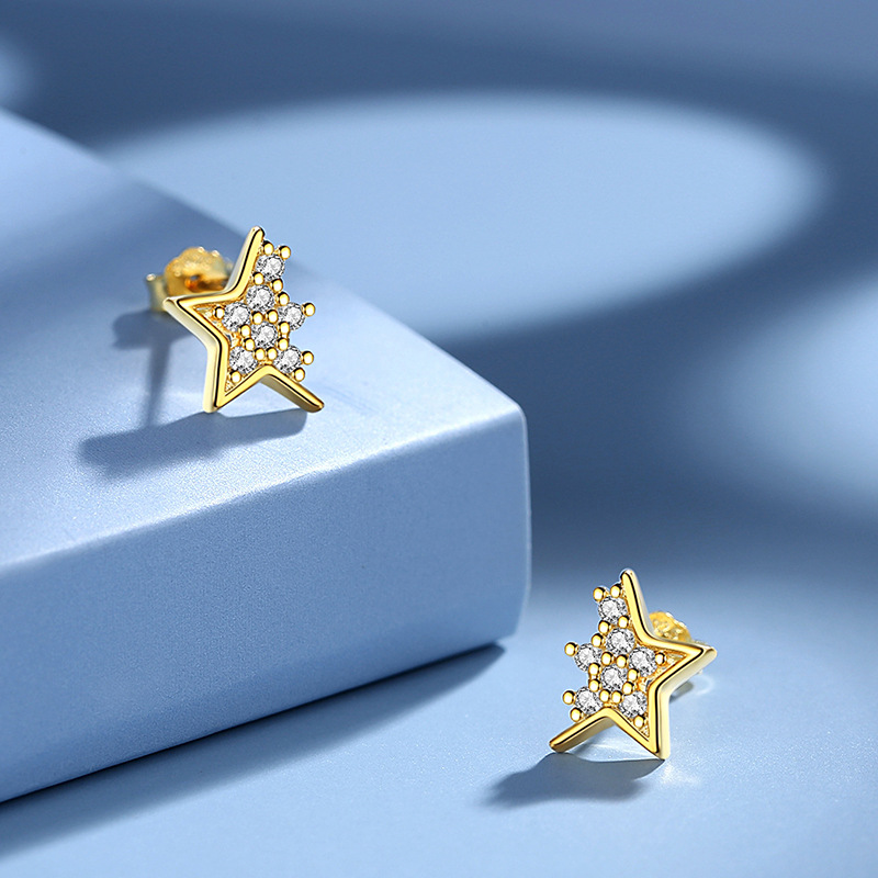 Pendientes de plata aguja femenina creativa estrellas pendientes de plata s925 al por mayor diamante diseño coreano SENTIDO DE Japón y Corea viento