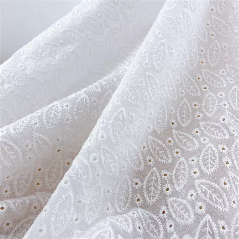 厂家直销全棉打孔绣花布 9088棉布镂空刺绣服装绣花蕾丝花边面料