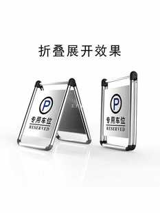 6E3Xa stainless steel no parking warning sign carefully slides the special parking space and folds up the do not park notice