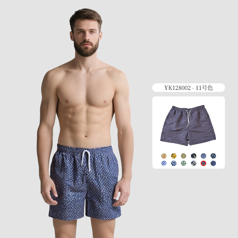 Pantalones de cuatro puntos florales de piel de melocotón para hombre, bañador casual de playa de tamaño europeo, forro de secado rápido, pantalones de playa de vacaciones junto al mar