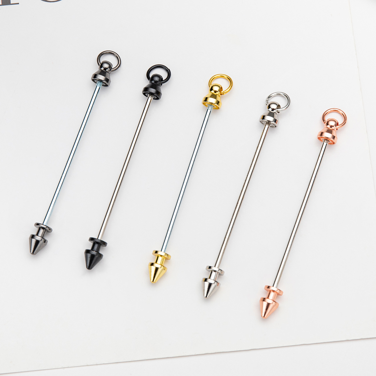 Inventario al por mayor bala de metal clavado tornillo de doble cabeza DIY accesorios llavero colgante clavado metal clavado