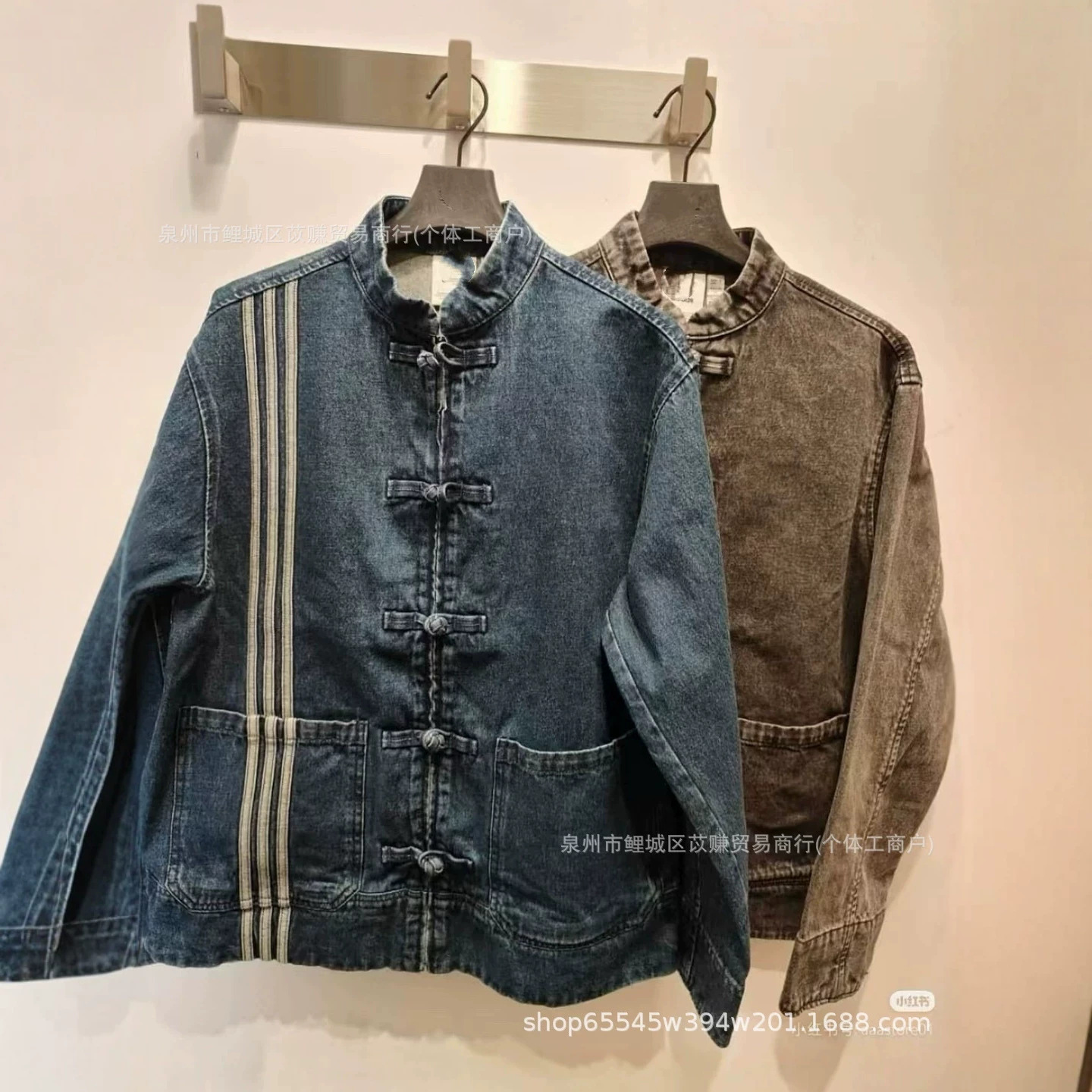Trendy Chinese-style denim jacket with stand-up collar and frog buttons, loose fit, durable, three-stripe design.