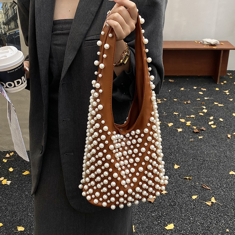Bolsas retro europeas y estadounidenses transfronterizas bolsas de hombro de gran capacidad para mujeres bolsas axilales personales de perlas de viaje bolsas de cubo de agua