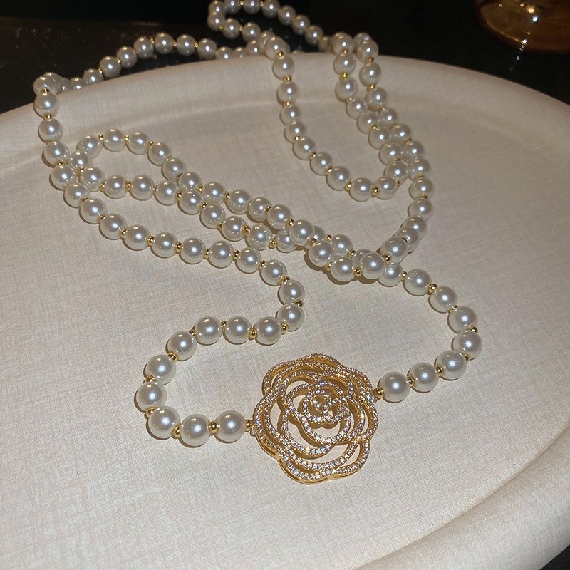 Collar con cuentas de perlas de gota de agua con diamantes transfronterizos otoño e invierno cadena de suéter de lujo ligero francés moda todo fósforo joyería de alta gama