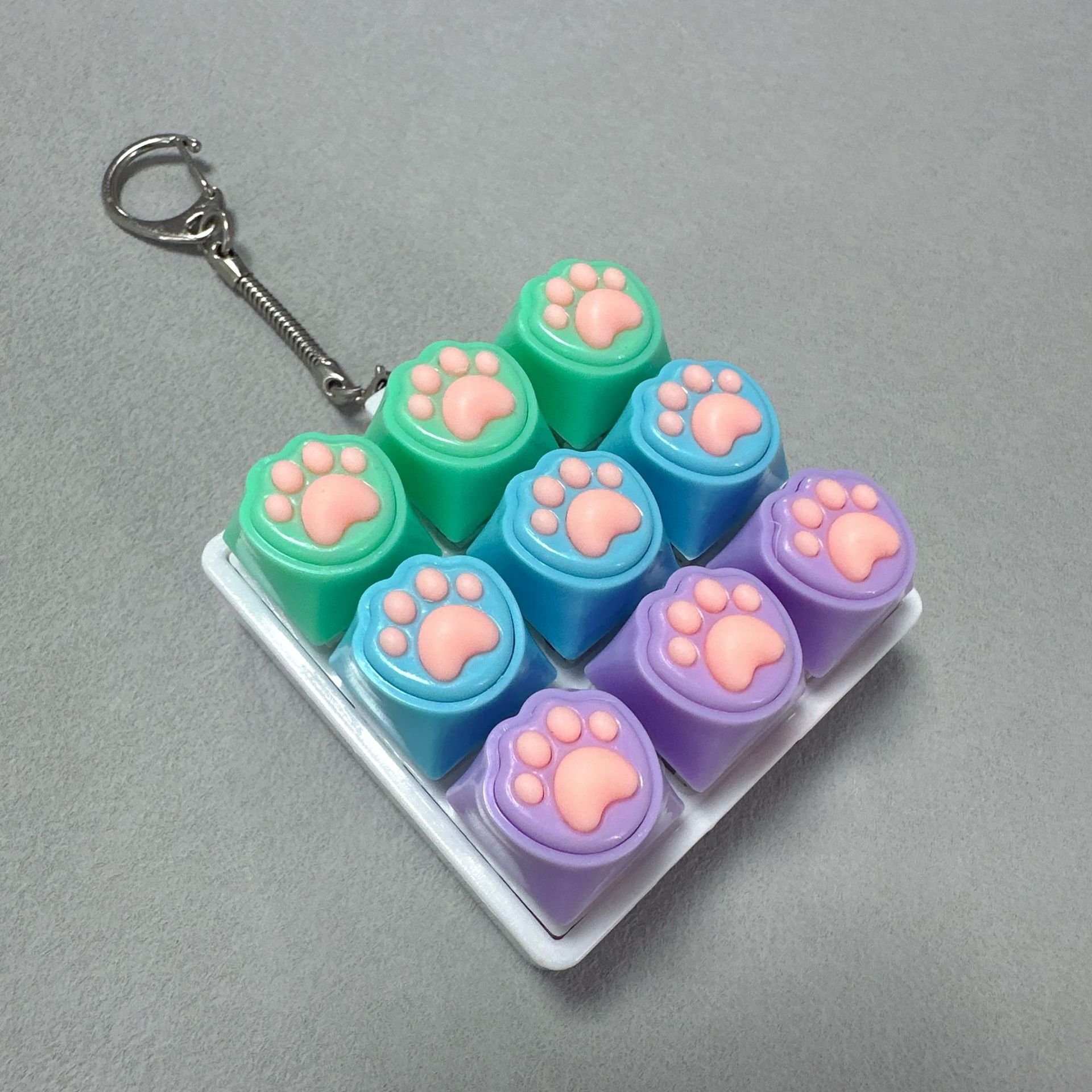 Nine-key white shell-silicone cat claw (green