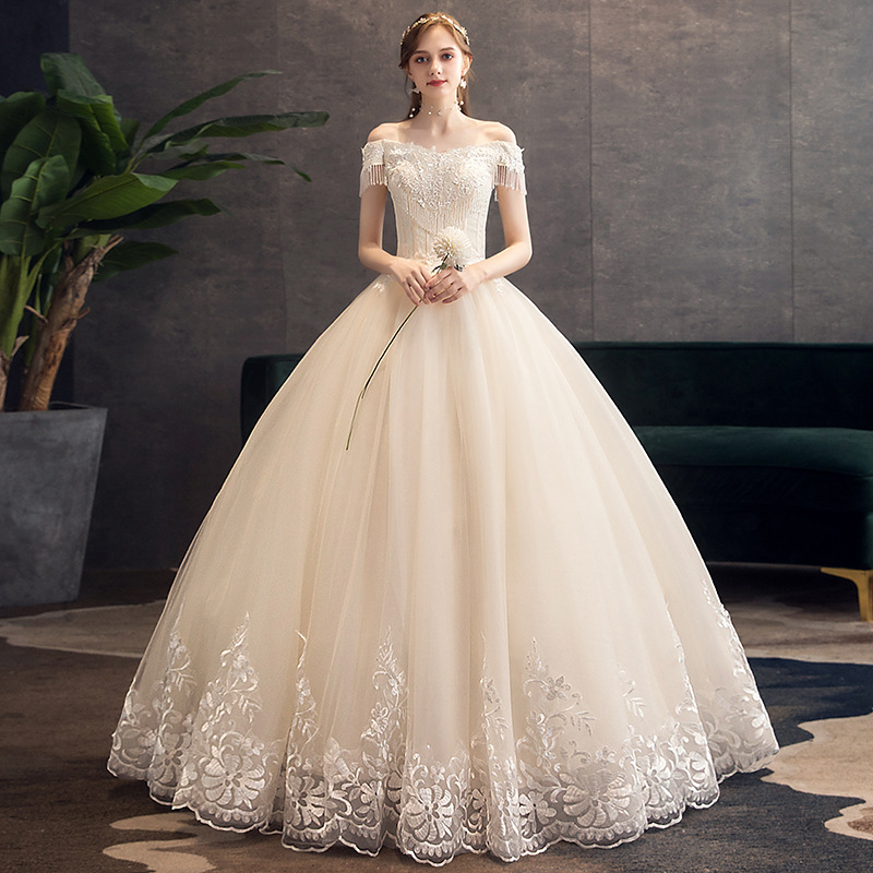 Champagne color off-shoulder large skirt wedding dress high-end slim bridal wedding dress spring new neat wedding dress wholesale