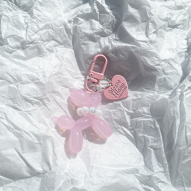 Pequeño Libro Rojo mismo lindo jalea globo láser perro llavero colgante colorido cachorro de dibujos animados teléfono llavero