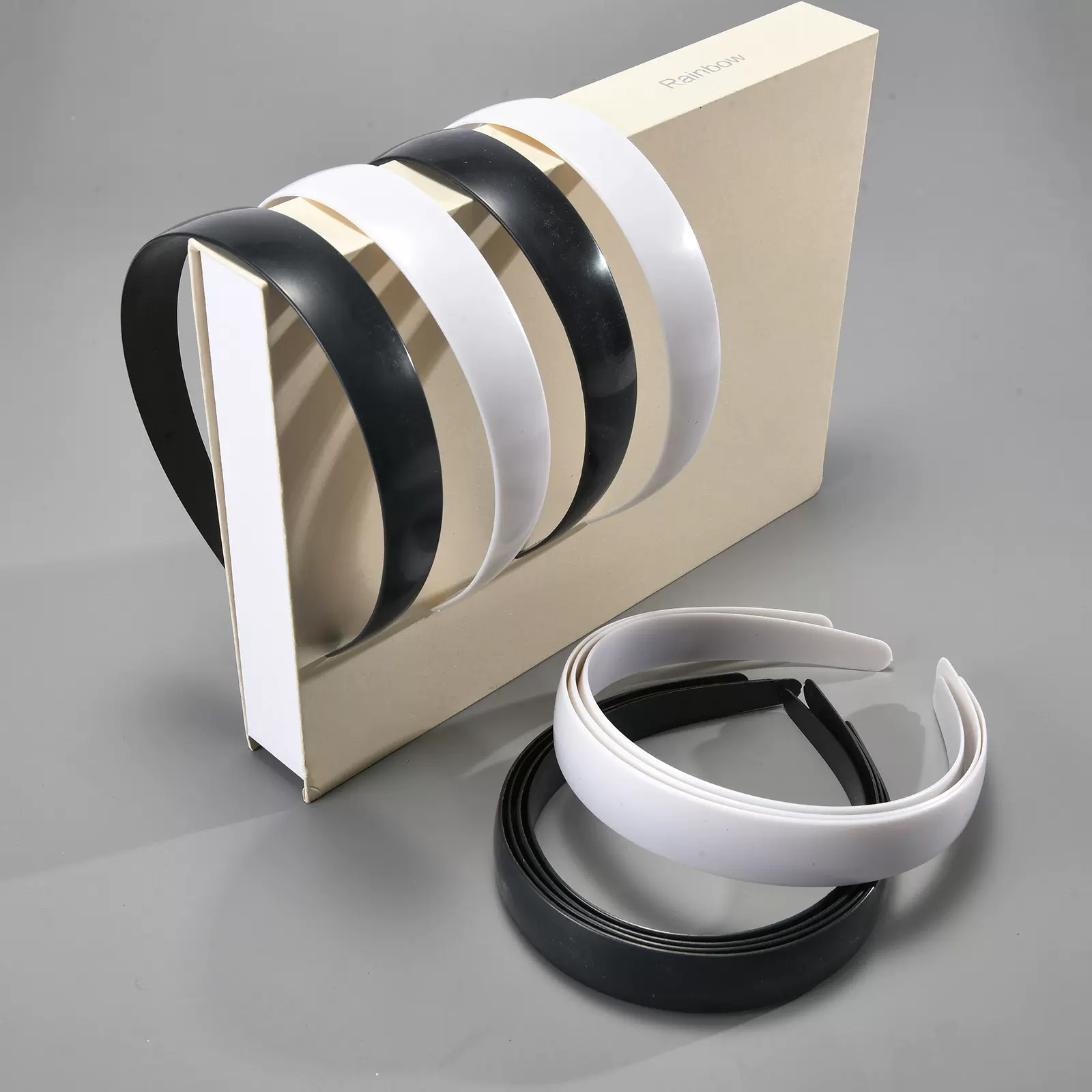 2.5公分厂家塑料发箍光板底胚新款有弧度无齿黑白ps材料DIY头发箍