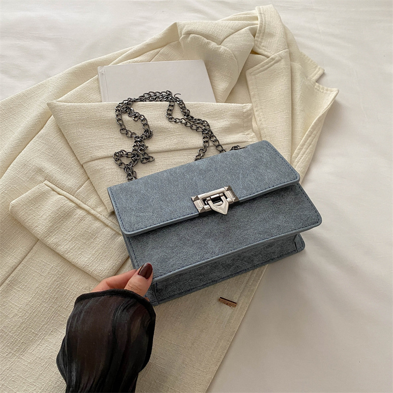 Bolsa de mochila de textura retro para mujeres 2024 nueva cadena coreana bolso cuadrado red rojo aire de viaje bolsa de hombro de moda