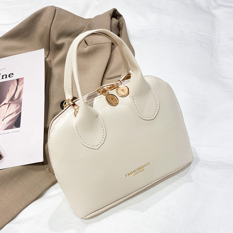 Bolso de comercio exterior transfronterizo mujer 2022 moda coreana impresión de hombro mochila bolso de mujer bolso de teléfono móvil al por mayor