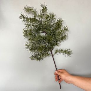 Manufacturer wholesales simulated plant pine needle branches, new Chinese style floral bonsai welcoming pine, money pine ornaments and decorations