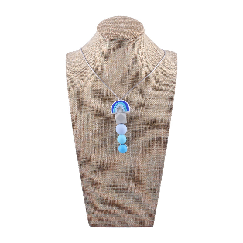 Bebé molar mordedor perlas colgante masticable colgante accesorios de ropa para niños de dibujos animados Arco Iris colgante collar mordedor