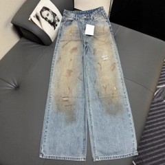 南油高端女装 2025秋季新款AC风后拼接皮袋做旧脏脏破洞牛仔裤女
