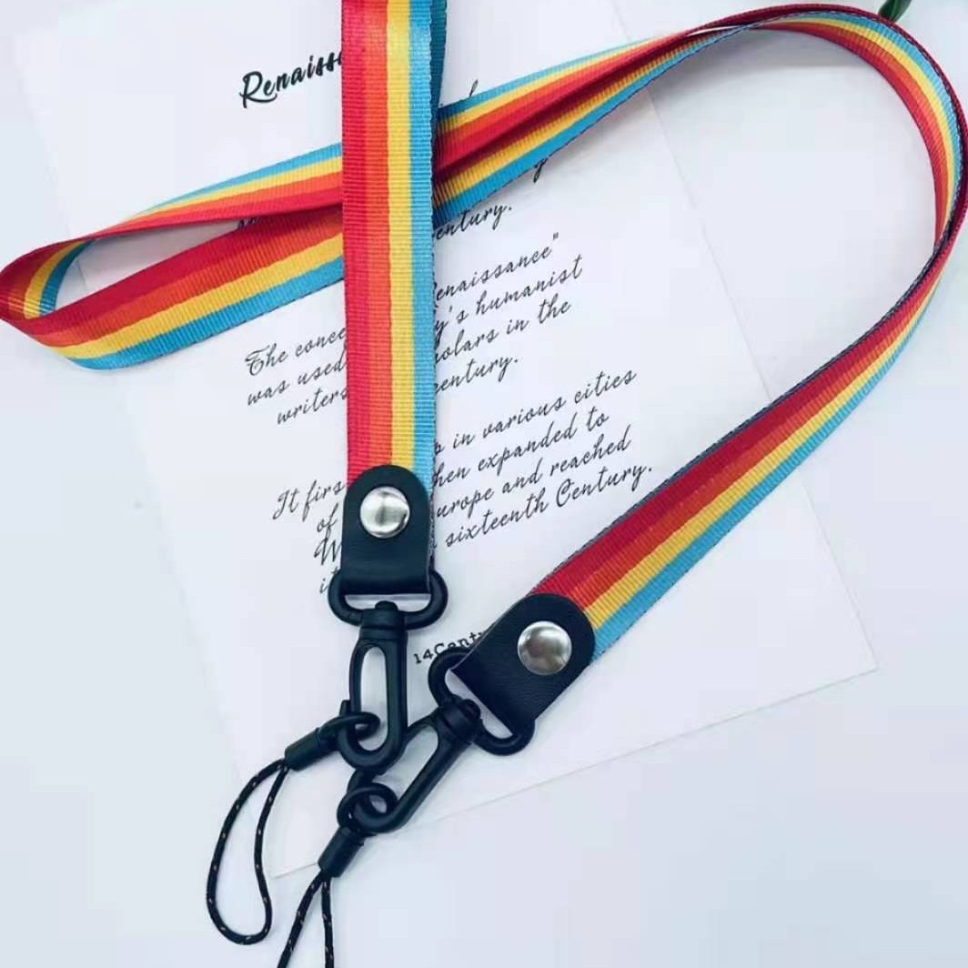 Verano nuevo en stock cordón a juego de color de cuatro colores corto teléfono móvil Halter cordón desmontable Arco Iris cuerda larga para hombres y mujeres