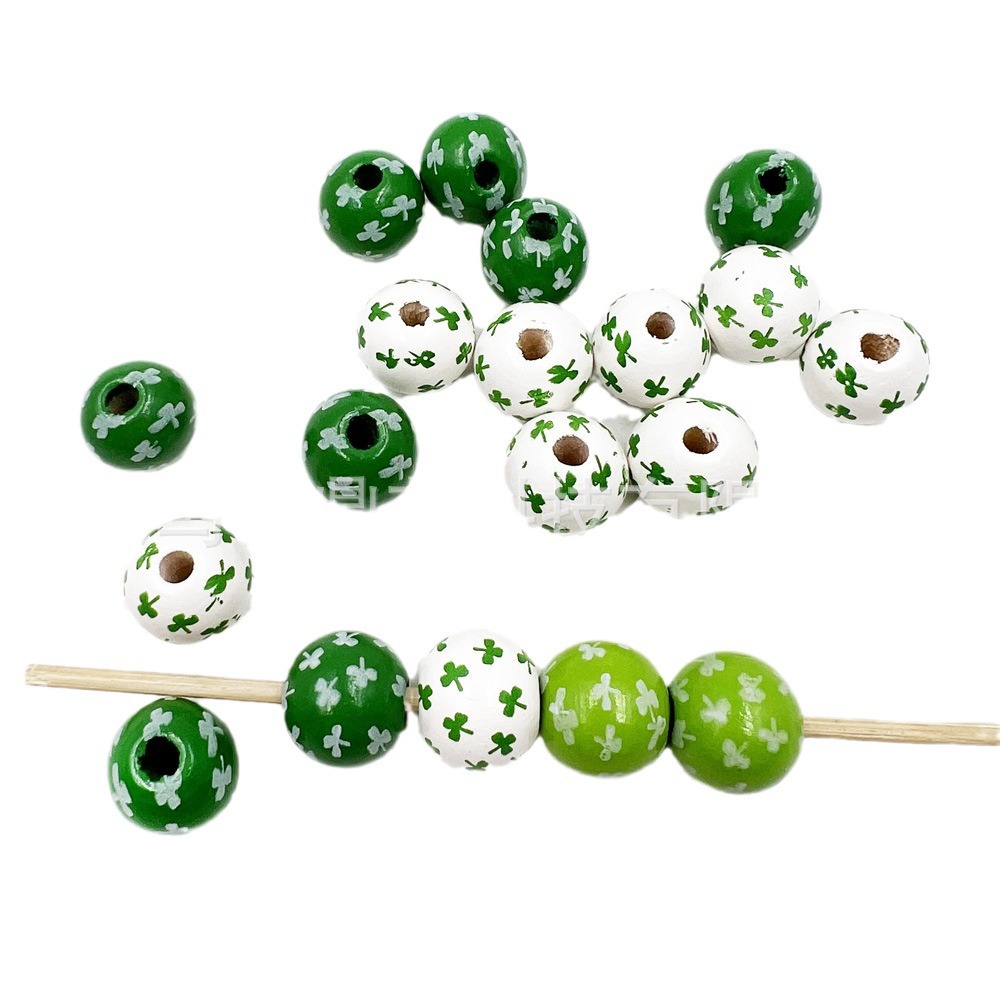卸売りプリント木珠アイルランド日木珠クローバー四葉草形散珠diyビーズアクセサリー部品