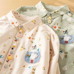 デニムの布のプリントの襟の刺繍のシャツの女性の2025春夏の甘い通勤の毛の長袖の洋風のカーディガンの薄いです。