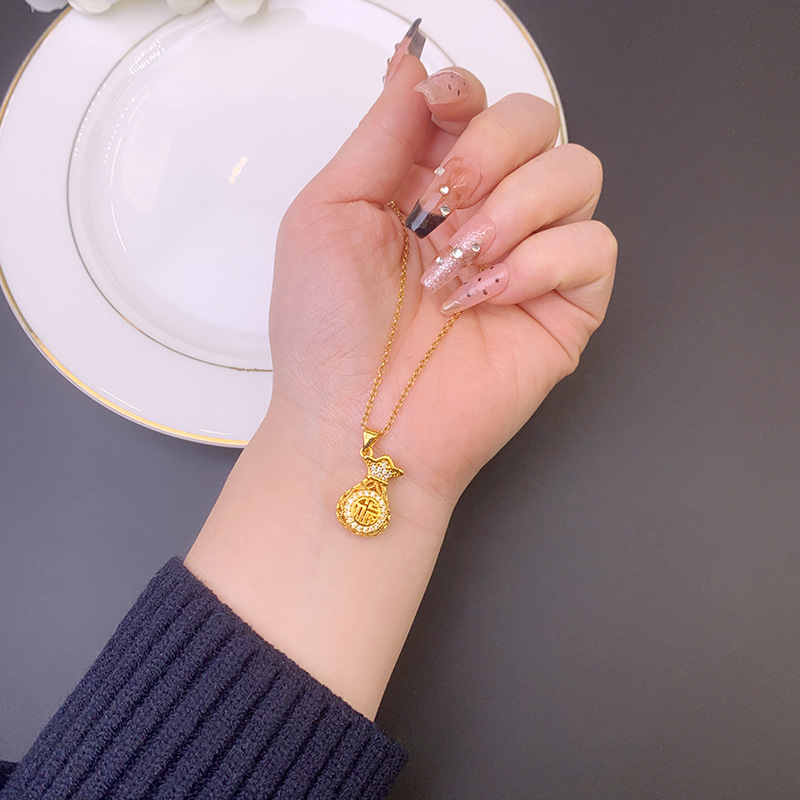 Nuevos colgantes de oro antiguos Fasha retro bolsas de dinero con diamantes huecos colgantes de bolsas de bendición para niños no se desvanecen accesorios al por mayor