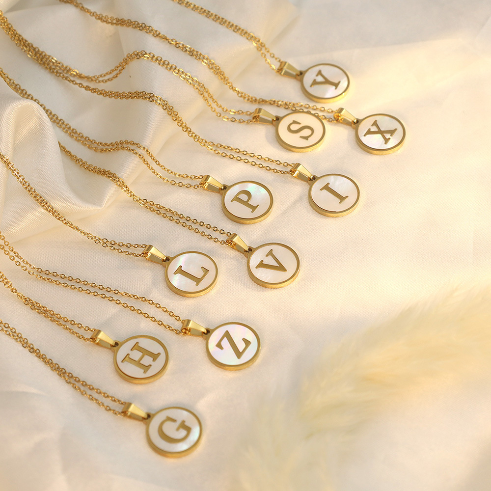 Brand pendant with letters